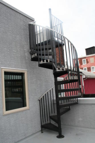 Spiral staircase to roof-top patio