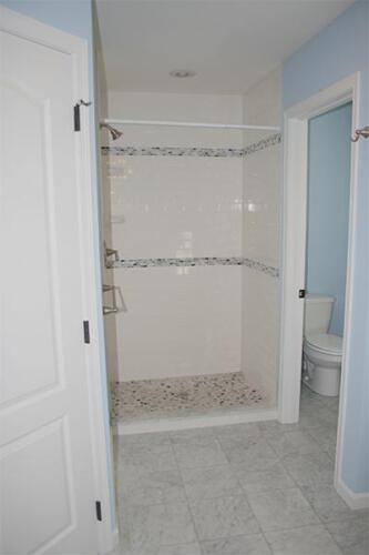 Full bathroom with a shower